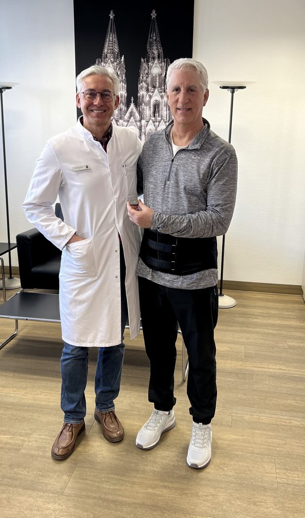 Dale with his surgeon in Cologne, Germany during his ADR journey